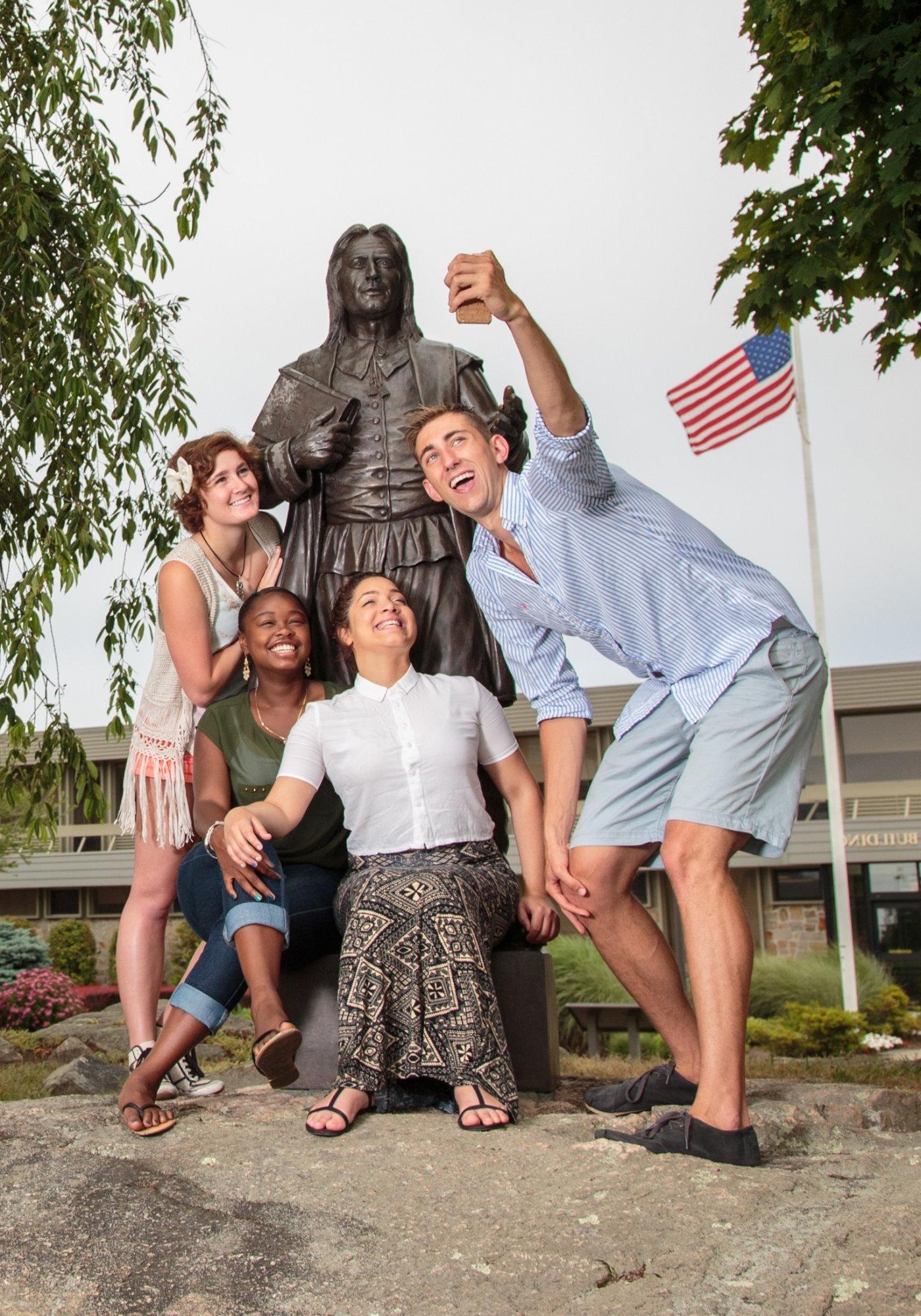 Students by the Roger Statue.