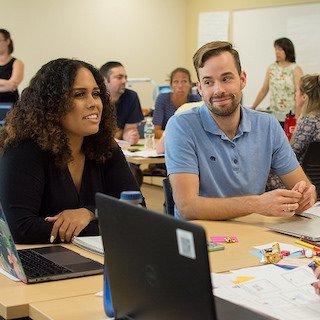 Two UC students in class